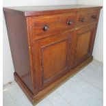 A Victorian mahogany side cabinet with t