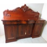 A Victorian mahogany pedestal sideboard