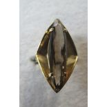 A 9ct gold ring inset with oblong citrin