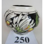 A contemporary Moorcroft vase in the Pho