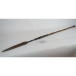 An African spear with iron paint on wood