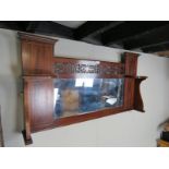 An Edwardian inlaid mahogany over mantle