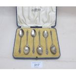 A set of six silver apostle teaspoons, B