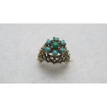 A 9ct gold ring inset with turquoise, si