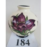 A contemporary Moorcroft vase in the 'Pu