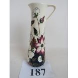 A contemporary Moorcroft jug in the 'Bra