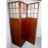 An Edwardian mahogany three fold screen