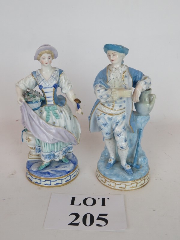 A pair of 19th century porcelain figures