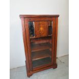 An Edwardian inlaid rosewood music cabin