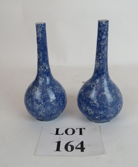 A pair of Chinese bottle vases, hand pai