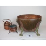 Antique copper and brass planter with lion mask handles and paw feet, 43 cm wide,