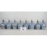 Eight Scottish Buchan stoneware spirit flasks, named, including 'Arsenic',