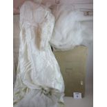 A 1960's Liberty's wedding dress and veil, both boxed,