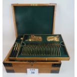 A decorative gold-plated 139 piece part suite of cutlery,