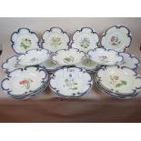 A 19th century 27 piece porcelain 'Botanical' table service,