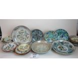 A collection of Glyn Colledge plates and shallow bowls in various patterns, largest 32 cm diameter,