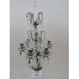 An elegant French period-style cut glass and bronzed metal six-light table centre piece,