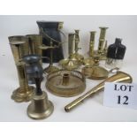 A collection of antique and vintage domestic metalware, to include postal scales, chamber sticks,