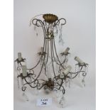 Cut glass chandelier with brass fixings, approx 60 cm from top arch to bottom drop, wired,