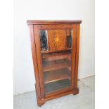 An Edwardian inlaid rosewood music cabinet, 37" high x 21" wide x 13.