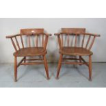A pair of early 20th Century elm seated captains chairs est: £100-£200