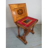 A Victorian pale oak and burr elm ladies work table with a fully fitted interior over an