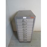 A small metal filing cabinet with ten small drawers,