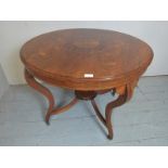 An excellent quality Edwardian rosewood centre table with inlay to top over four sweeping legs and