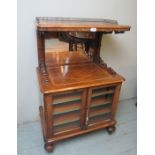 A fine Victorian inlaid walnut music cabinet / whatnot with a pierced brass gallery rail to top