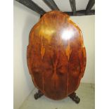 A superb 19th Century Rosewood tilt top supper table with a detailed shaped edge over a finely