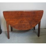 A 19th Century oak drop leaf dining table in clean condition est: £30-£50