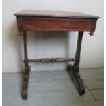 A Victorian mahogany converted work / side table with a single blind drawer over carved upright