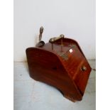 A 19th Century mahogany coal box with a brass carry handle and hinges and complete with shovel to