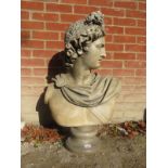 A large bust depicting a Roman male figure,