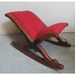 A 19th Century mahogany framed gout stool upholstered in red material est: £50-£80