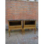 A pair of contemporary gilt painted bedside cupboards with green marble tops in good condition est: