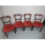 A good set of four Victorian mahogany balloon back dining chairs upholstered in burgundy est: