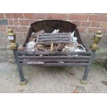 A 19th century wrought iron one section fire basket with brass finial's est: £50-£100