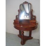 A Victorian mahogany demi lune dressing table with a swing mirror est: £40-£60