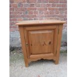 A small 20th Century pine cabinet with a single panelled door est: £20-£40