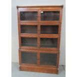 An early 20th Century oak Globe Wernicke style stacking bookcase (four sections) est: £100-£150