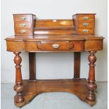 A Victorian mahogany duchess writing table, 37.5" high x 42" wide x 17.