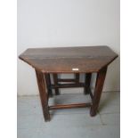 A late 17th / early 18th Century oak drop leaf side table with a later drop leaf panel est: £50-£80