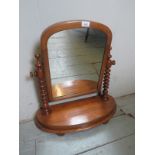 A Victorian mahogany table top / toilet mirror with barley twist upright supports and turned