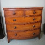 A 19th Century mahogany bow front chest of two short over three long graduated drawers with bun