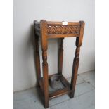 An early 20th Century oak hall umbrella / stick stand complete with metal drip tray and pot to base