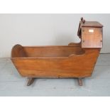 A 19th Century wooden child's rocking crib est: £30-£50