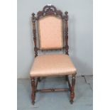 A 19th Century walnut carved chair with