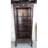 A hardwood C1900 Chinese display cabinet