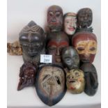 Twelve masks to include, seven good Afri